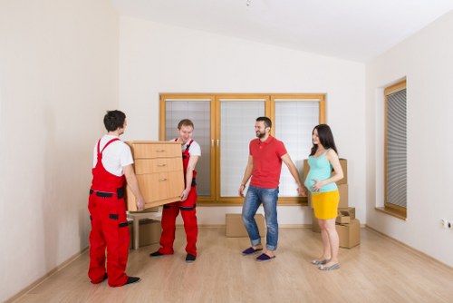 Organised unpacking of boxes in a Barking home after relocation