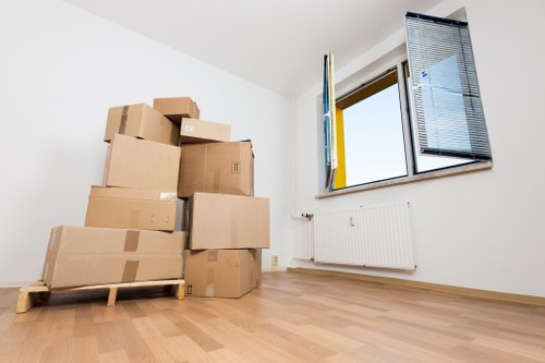 Loading furniture into a removal truck in Barking