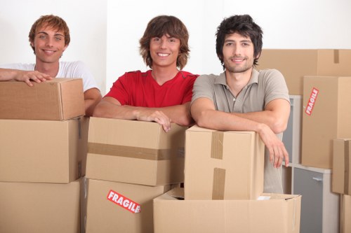 Removal van loading items near a Barking property