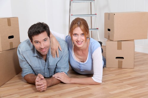 Loading furniture into a van for a Barking home relocation