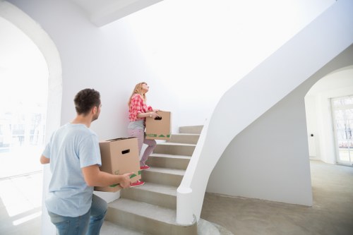 Team handling furniture during a Barking house move