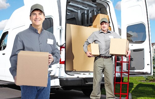 Commercial moving van loading office furniture for a Barking move