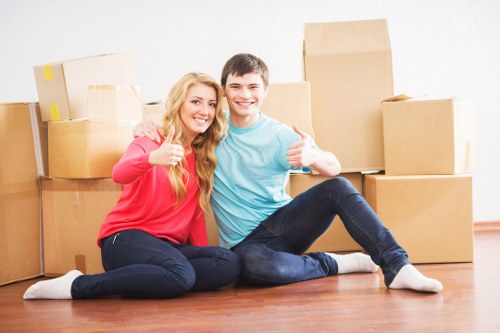 Loading furniture into a removal van in Barking