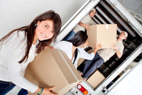 Boxes and furniture loaded into a moving van in Barking