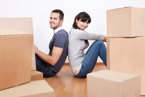 Team handling desks and boxes during an office move